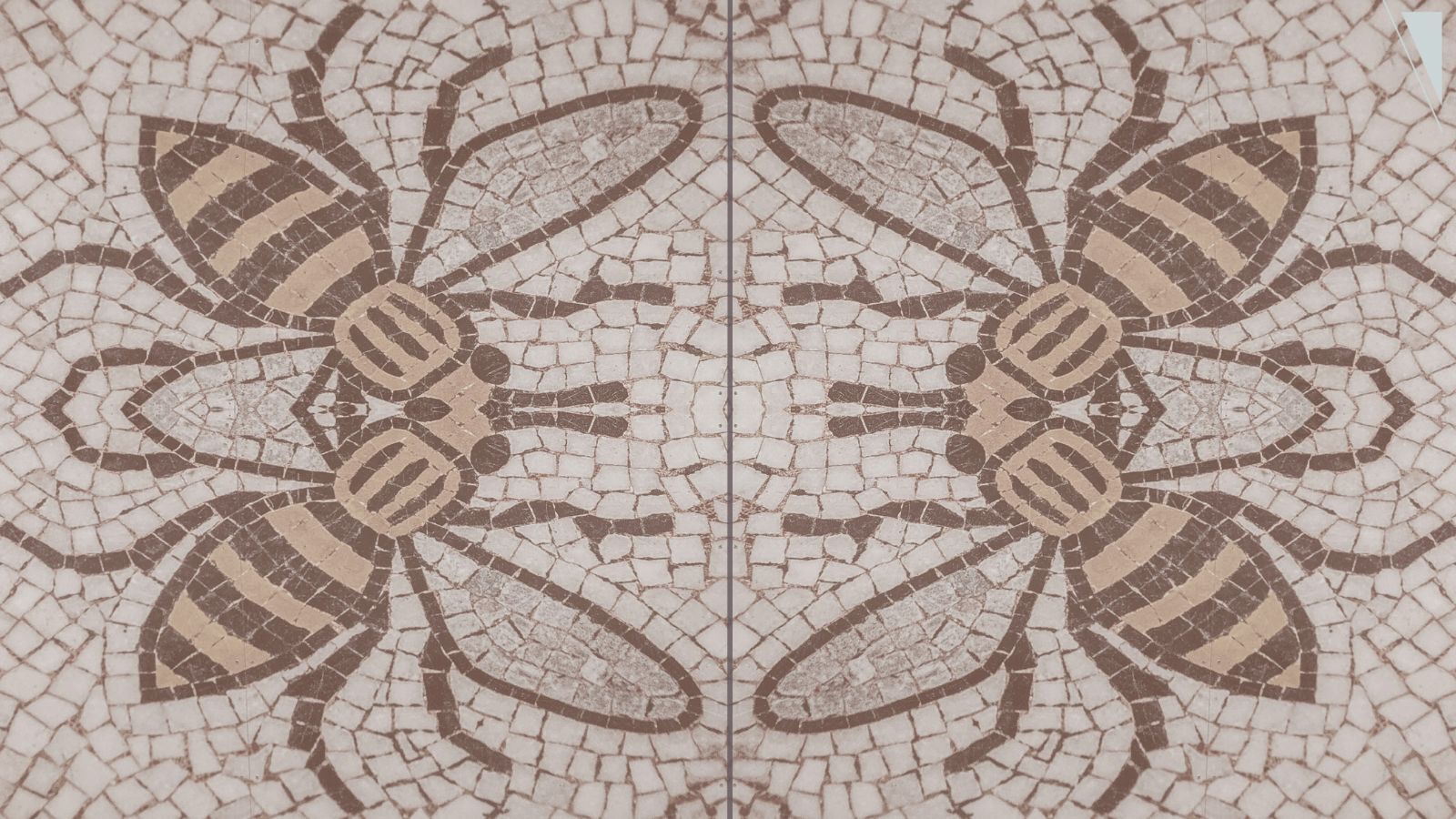 A floor mosaic of bees.
