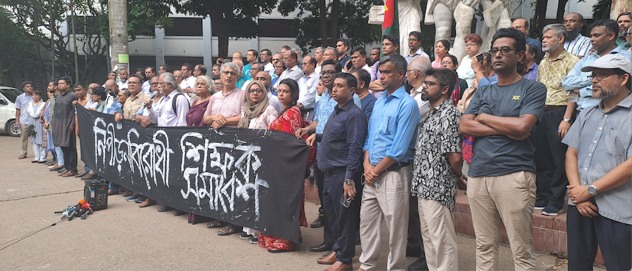 Faculty protests at Dhaka University on Wednesday July 17. The banner reads: “Teachers Against Repression.”