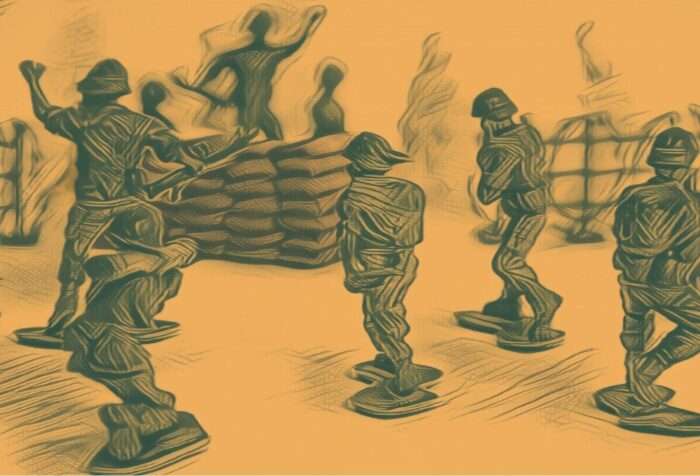 Toy soldiers arranged in battle.