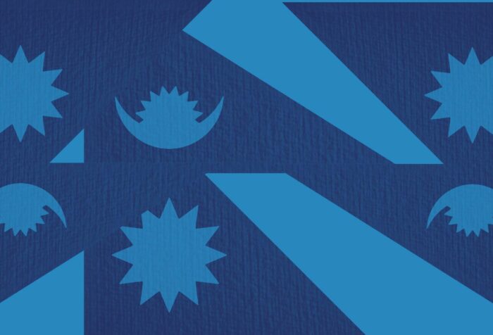 Dark blue background with light blue shapes, taken from the shapes of the Nepal flag, against it.