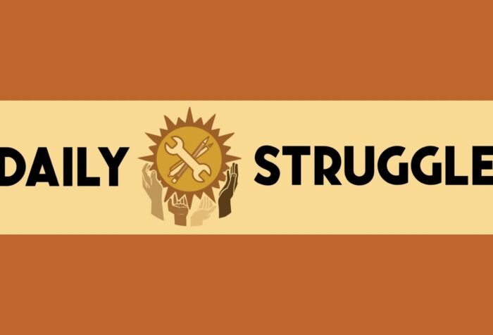 A burnt orange background with a yellow rectangle in the middle. Inside the rectangle in black capitalized text says DAILY STRUGGLE, with the logo between the two words. The logo is a gear shape being held up by hands of all skin colors, and inside the gear is a wrench crossed with a pen and pencil.