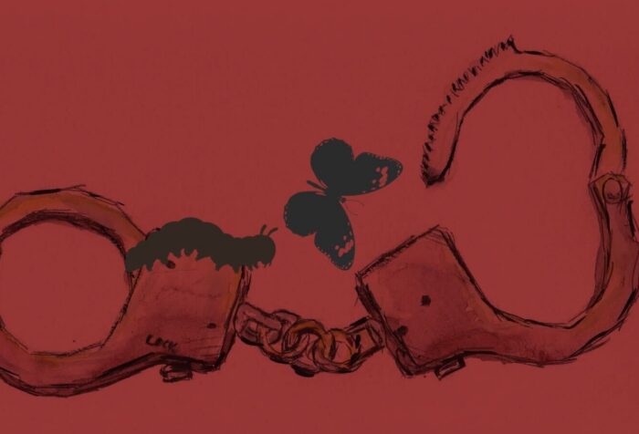 Against a red background, a sketch of handcuffs with a caterpillar and butterfly crawling and flying off of them.