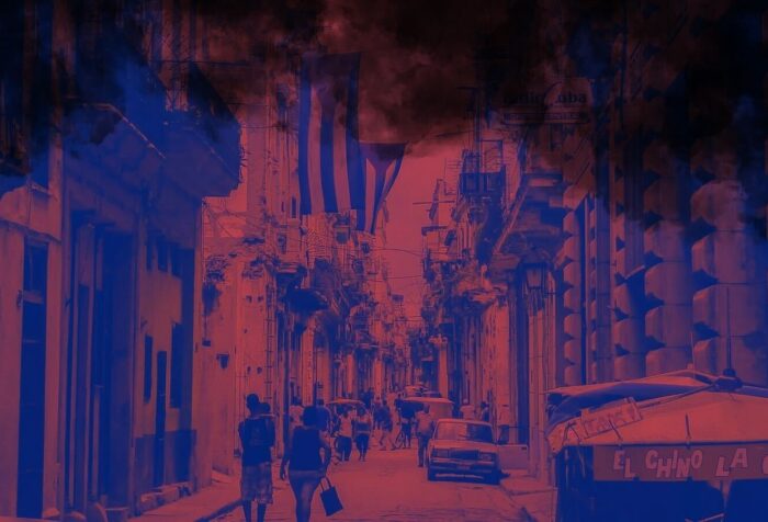 A pink and blue photo of a street in Cuba, with a smoke cloud edited over the top.