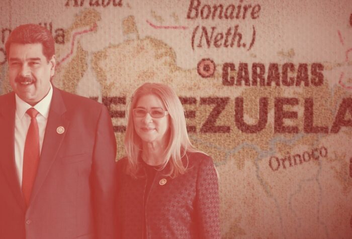 A photo of Nicolas Maduro and Cilia Flores edited in front of a map of Venezuela.