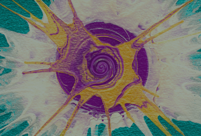 A spinning circle of paint on a canvas in purple, yellow, white, and turqoise hues.