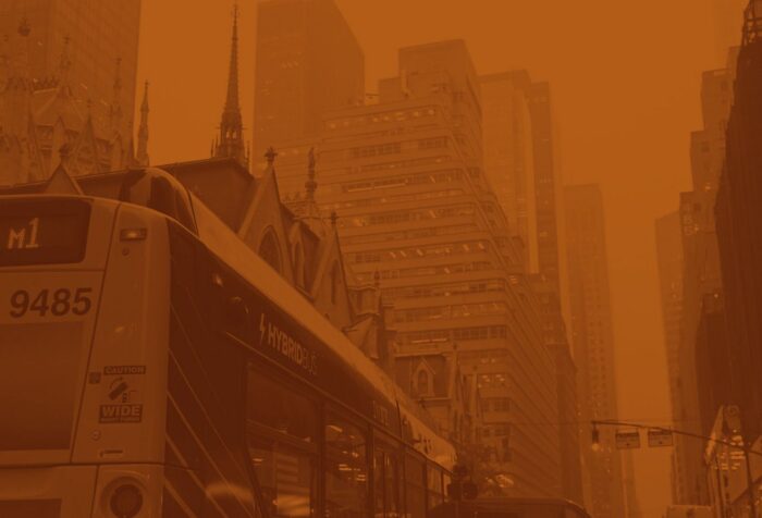 Photo of a city covered in smog.