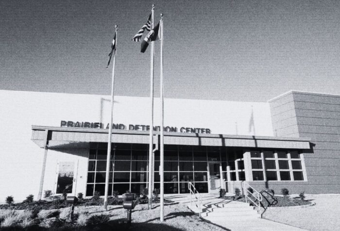 A black and white photo of the Prairieland detention center.